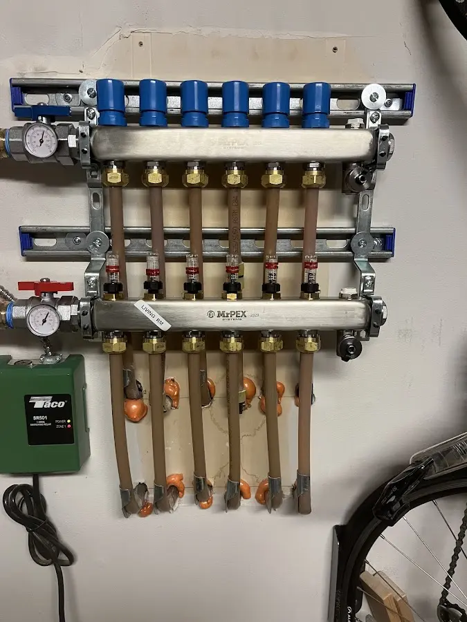 Plumber performing Water Heater Repair at a residential property in Grand Island